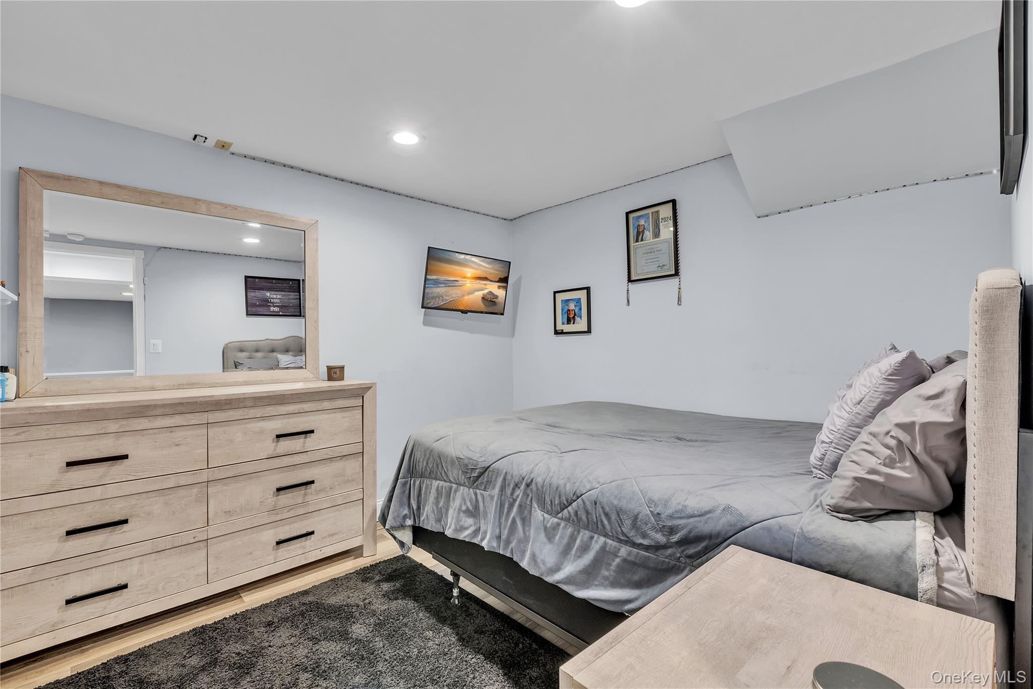 297 Church Road Putnam Valley, NY 10579 - Photo 29 of 42 a bedroom with a bed and a mirror