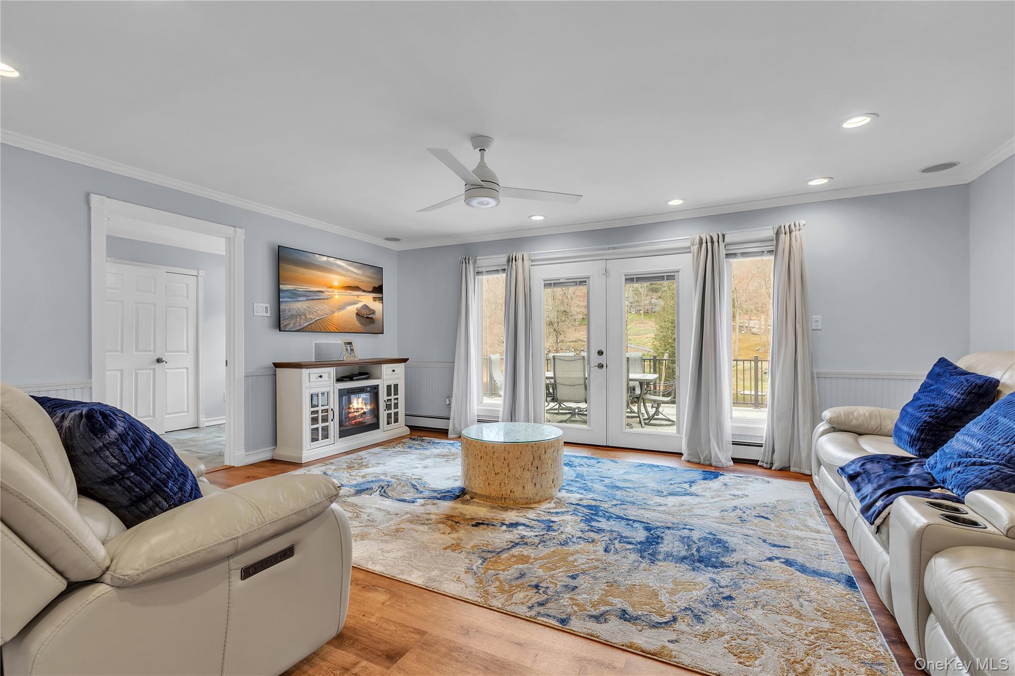 297 Church Road Putnam Valley, NY 10579 - Photo 10 of 42 a living room with furniture and a flat screen tv