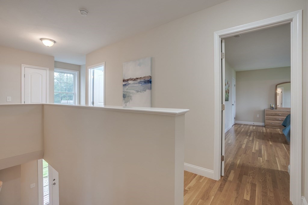 68 Diamondback Avenue Nashua, NH 03062 - Photo 17 of 22 a view of a kitchen from the hallway