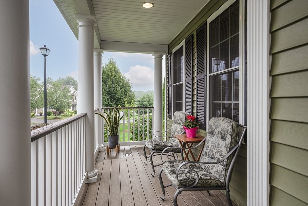 68 Diamondback Avenue Nashua, NH 03062 - Photo 21 of 22 a view of balcony with furniture