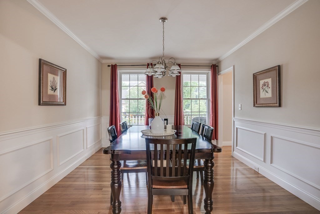 68 Diamondback Avenue Nashua, NH 03062 - Photo 8 of 22 a view of a dining room with furniture window and wooden floor