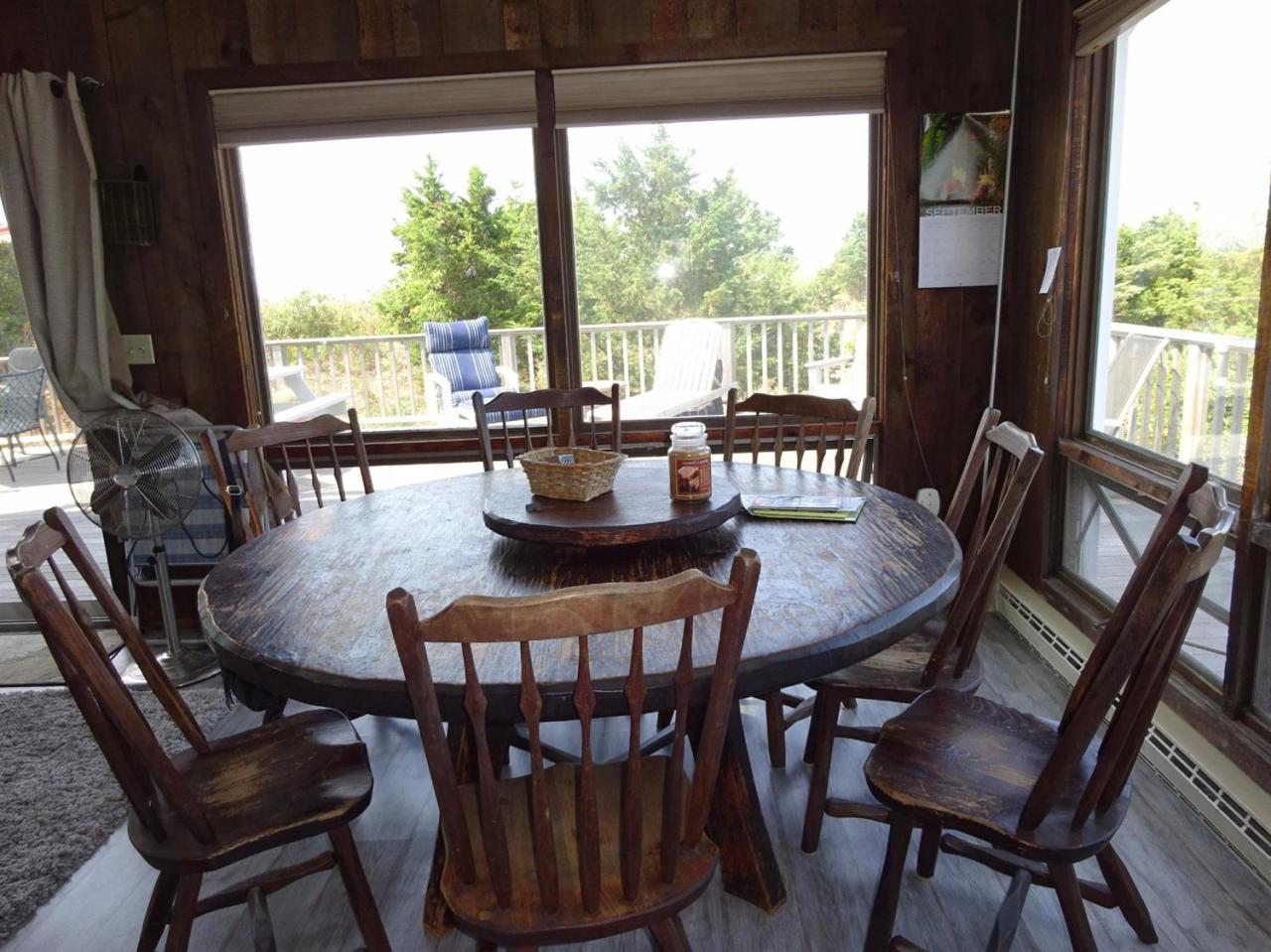 51 9th Street Wellfleet, MA 02667 - Photo 14 of 35 a view of a dining room with furniture window and wooden floor