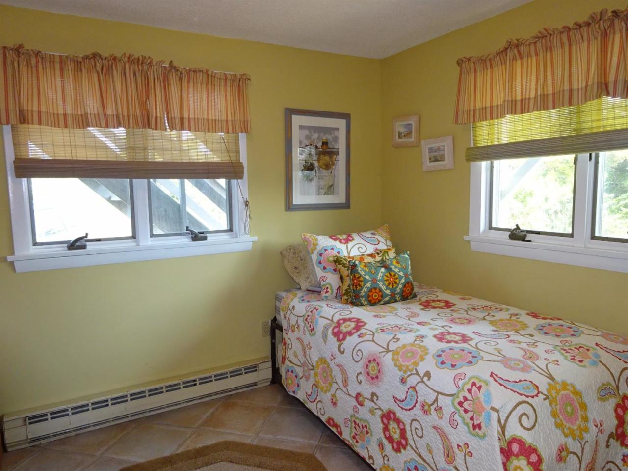 51 9th Street Wellfleet, MA 02667 - Photo 27 of 35 a bedroom with a bed and a window