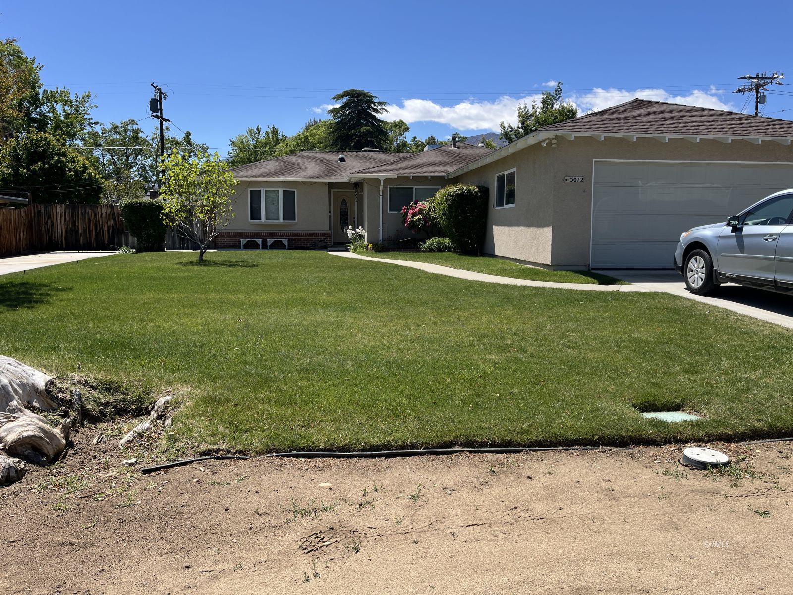 3012 Mesquite Road Bishop, CA 93514 - Photo 1 of 26 a view of a house with a backyard