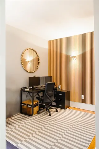 a view of a workspace with furniture