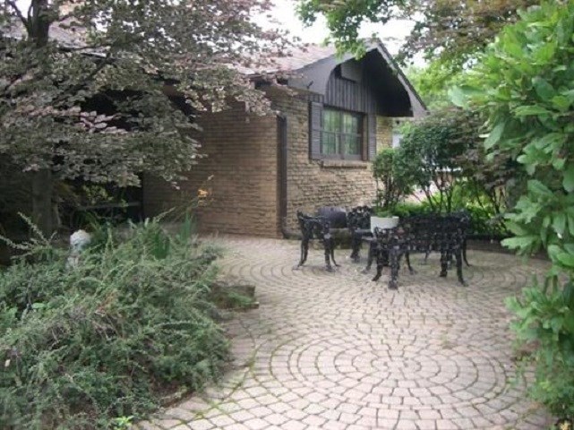 810 Roxbury Road Rockford, IL 61107 - Photo 1 of 13 a view of outdoor space yard and patio