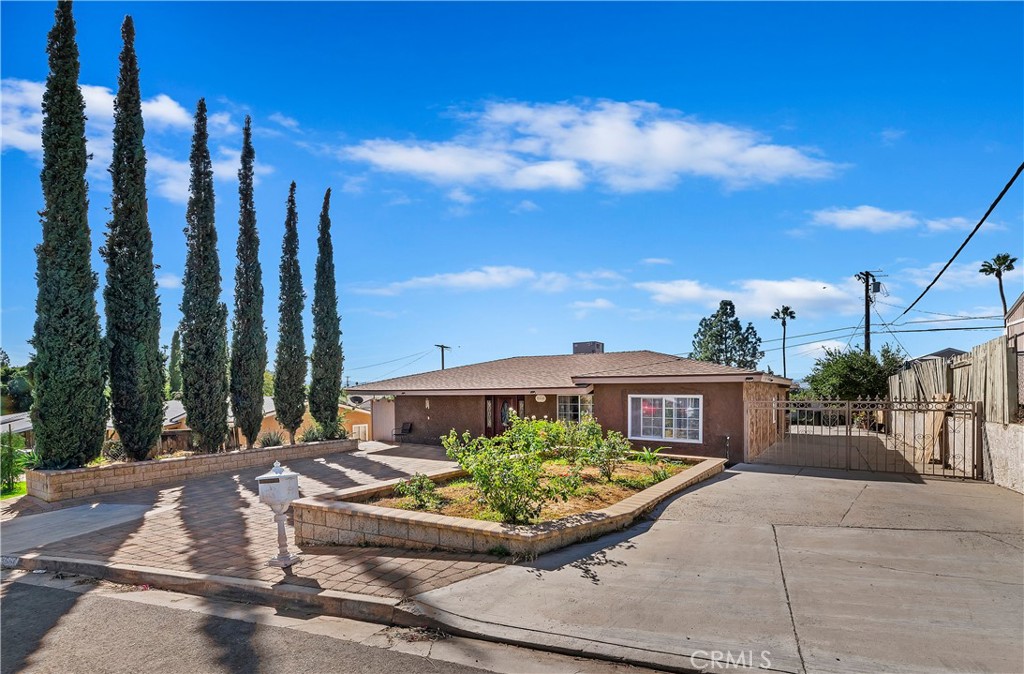 a view of a chair and tables in the patio