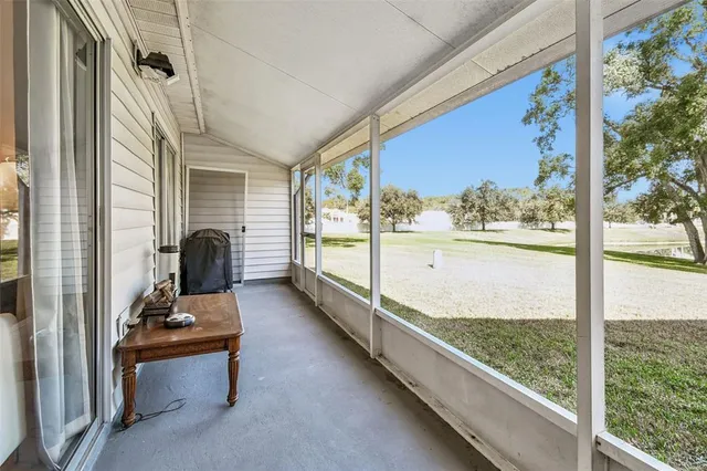 a view of a porch with furniture