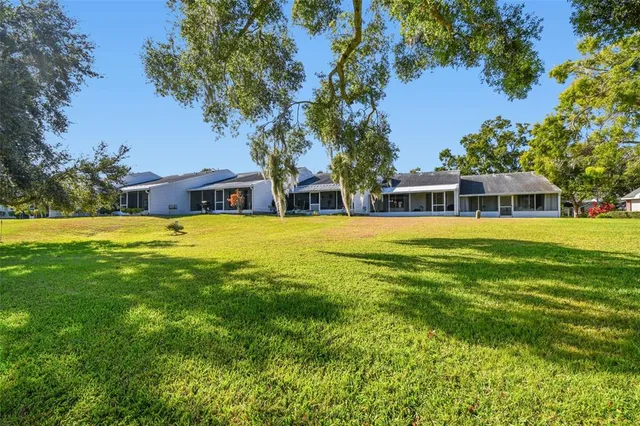 a view of a house with a big yard