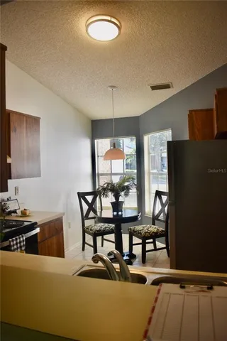 $240,000 | 3088 Grove Wood Boulevard, Unit B, Palm Harbor, FL 34683