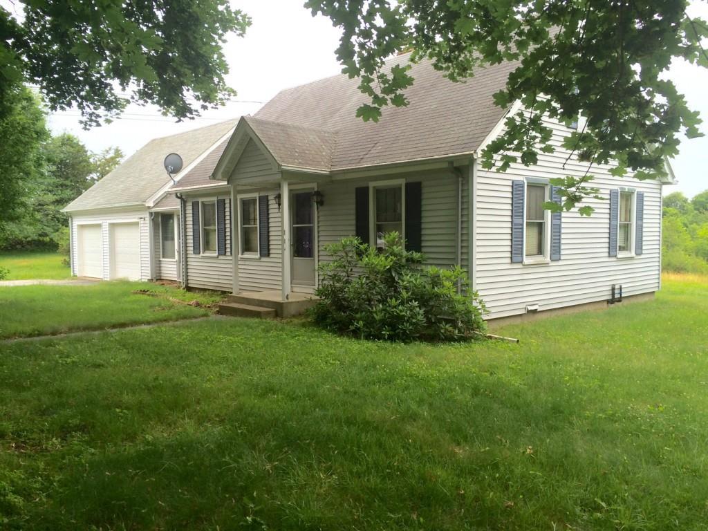 79 Watson Road Preston, CT 06365 - Photo 1 of 1 a front view of a house with a garden