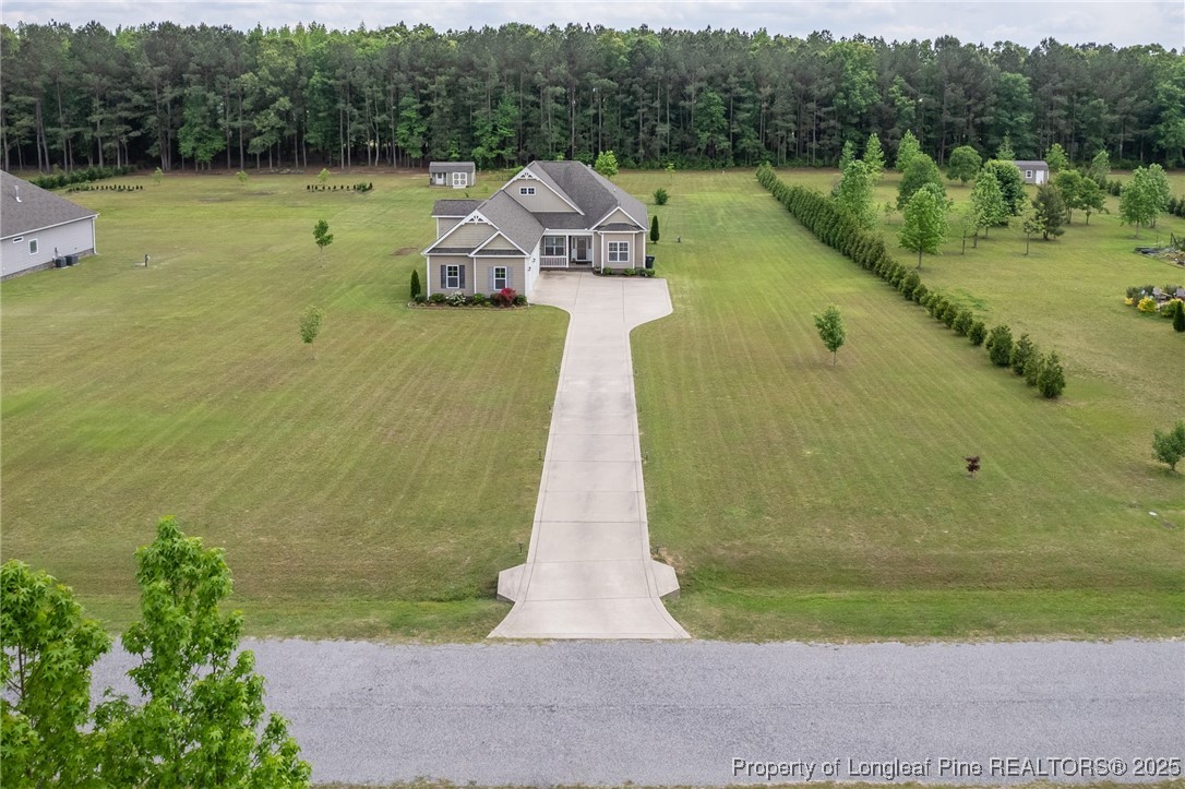 8220 Rivermist Lane Linden, NC 28356 - Photo 2 of 44 a view of a lake with houses