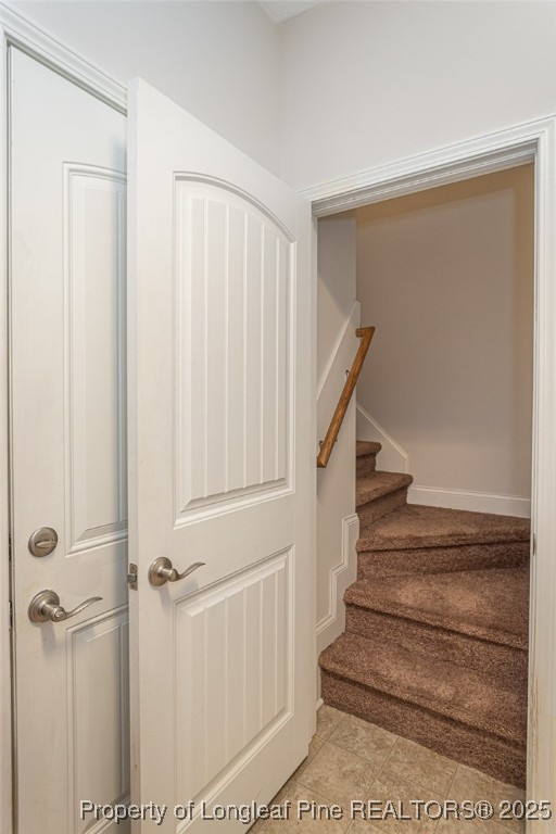 8220 Rivermist Lane Linden, NC 28356 - Photo 29 of 44 a view of staircase with white walls and white walls