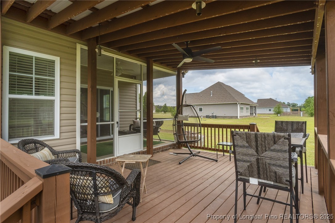 8220 Rivermist Lane Linden, NC 28356 - Photo 36 of 44 a view of a patio on the deck