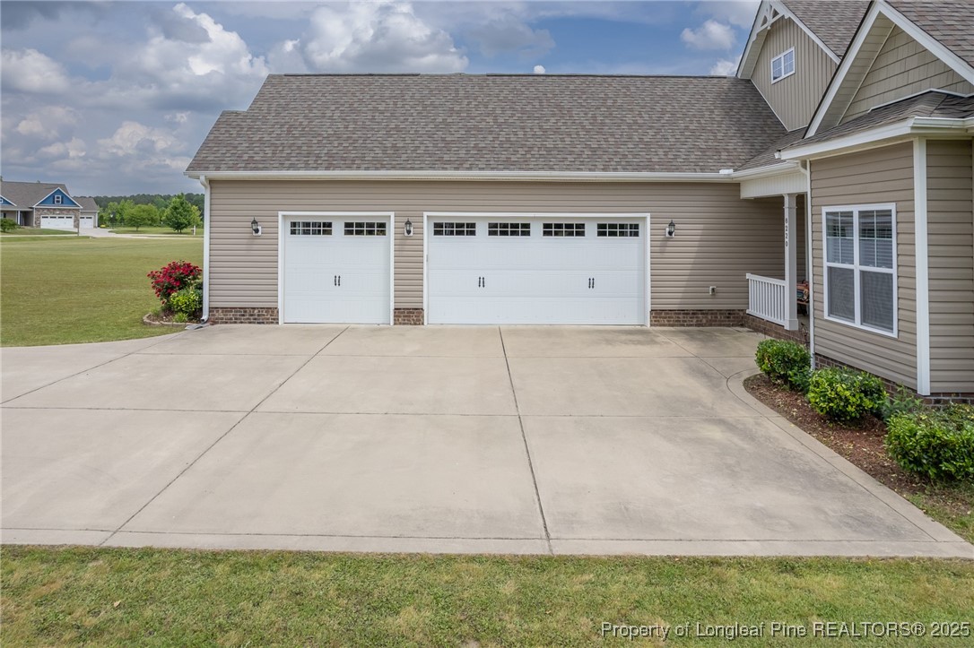 8220 Rivermist Lane Linden, NC 28356 - Photo 43 of 44 a house view with a outdoor space