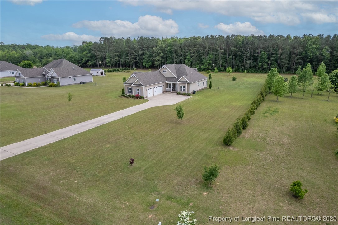 8220 Rivermist Lane Linden, NC 28356 - Photo 44 of 44 a view of a lake with a yard