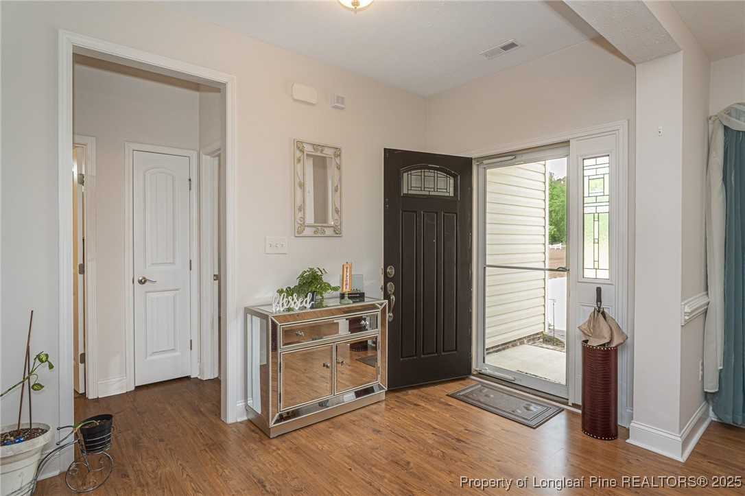 8220 Rivermist Lane Linden, NC 28356 - Photo 5 of 44 an empty room with windows and closet