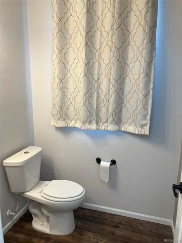 a bathroom with a toilet and a sink