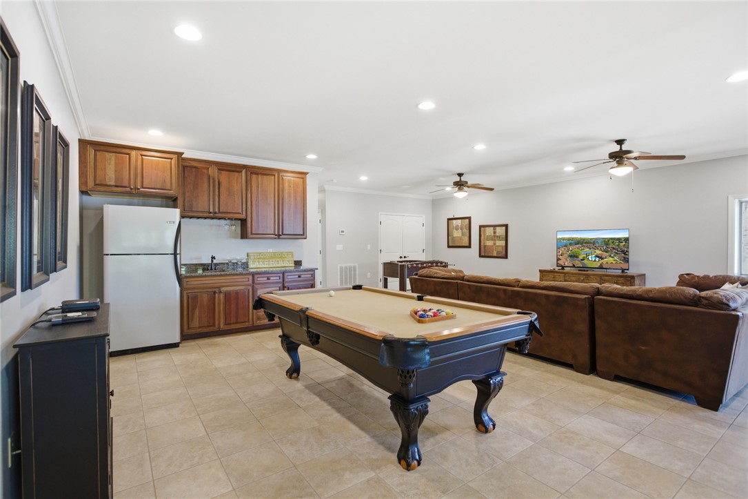 578 Sunset Point Drive West Union, SC 29696 - Photo 32 of 46 This expansive recreation room offers versatile entertainment and relaxation zones.