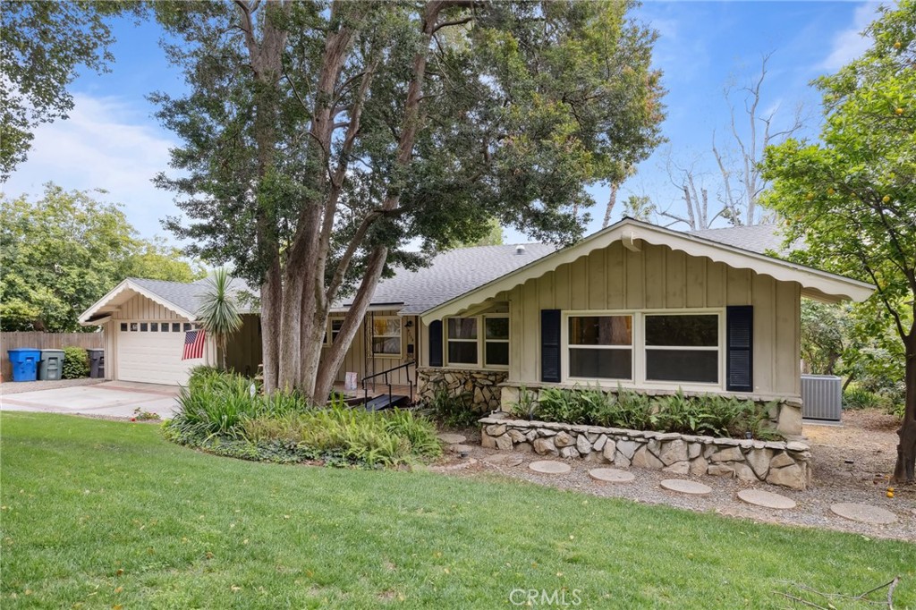 4254 Miramonte Place Riverside, CA 92501 - Photo 1 of 43 a front view of house with a garden