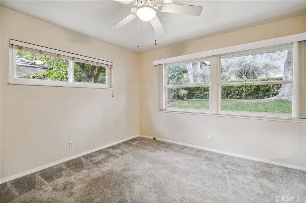 4254 Miramonte Place Riverside, CA 92501 - Photo 24 of 43 a view of an empty room with a window