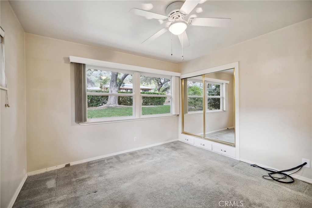 4254 Miramonte Place Riverside, CA 92501 - Photo 26 of 43 a view of an empty room with a window