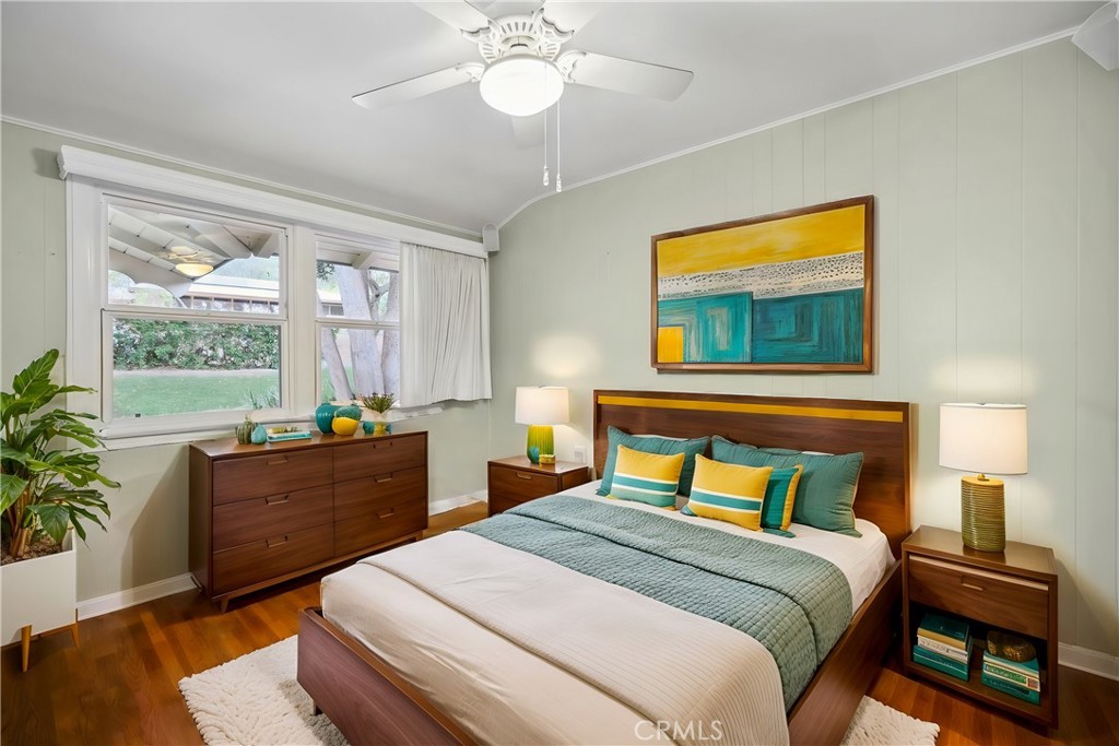 4254 Miramonte Place Riverside, CA 92501 - Photo 27 of 43 a bedroom with a bed and a window