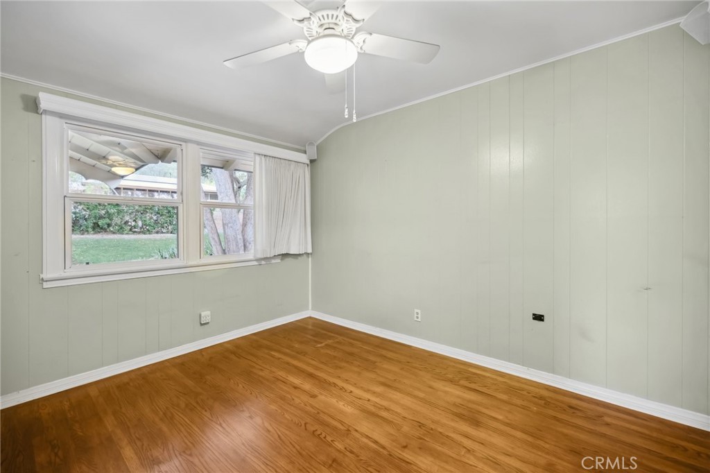 4254 Miramonte Place Riverside, CA 92501 - Photo 28 of 43 a view of empty room with wooden floor and fan