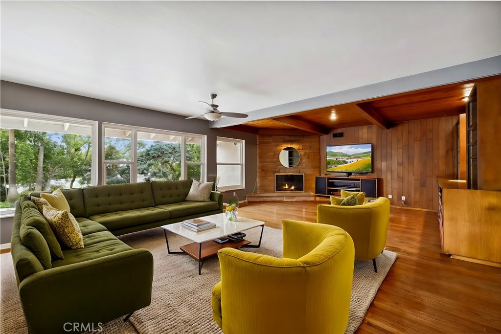 4254 Miramonte Place Riverside, CA 92501 - Photo 6 of 43 a living room with furniture and a large window