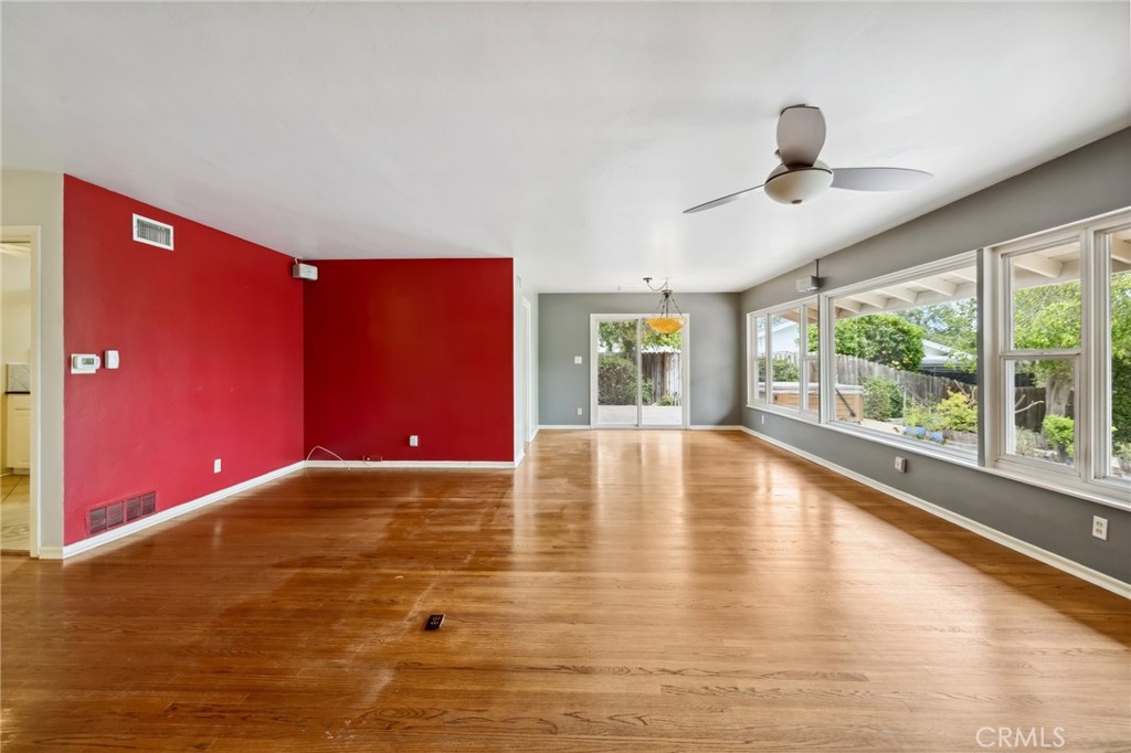 4254 Miramonte Place Riverside, CA 92501 - Photo 10 of 43 a view of empty room with wooden floor and fan