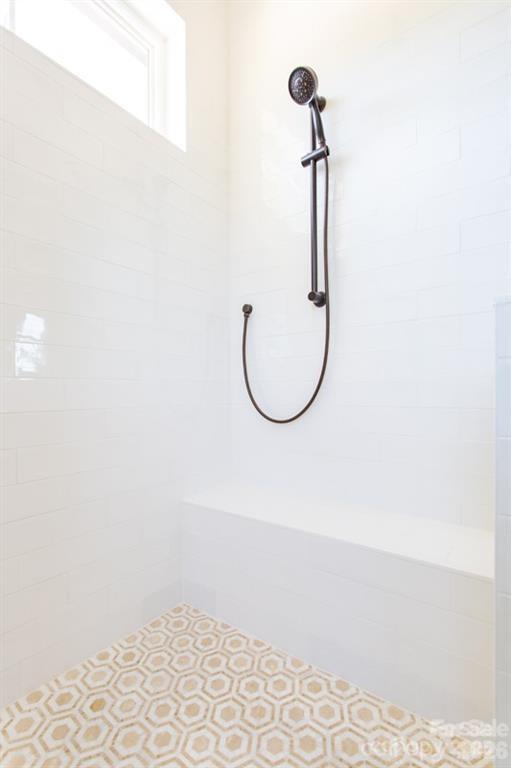 1 Antioch Church Road Weddington, NC 28104 - Photo 14 of 22 a bathroom with a mirror and a shower