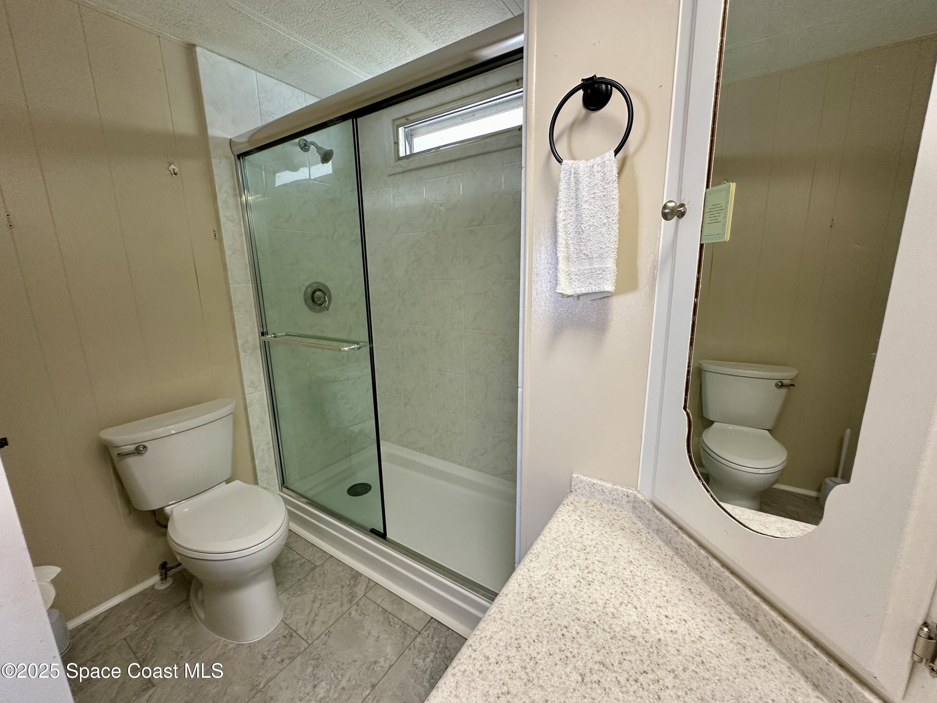 1675 Oceana Drive, Unit 5 Merritt Island, FL 32952 - Photo 9 of 14 bathrm 2