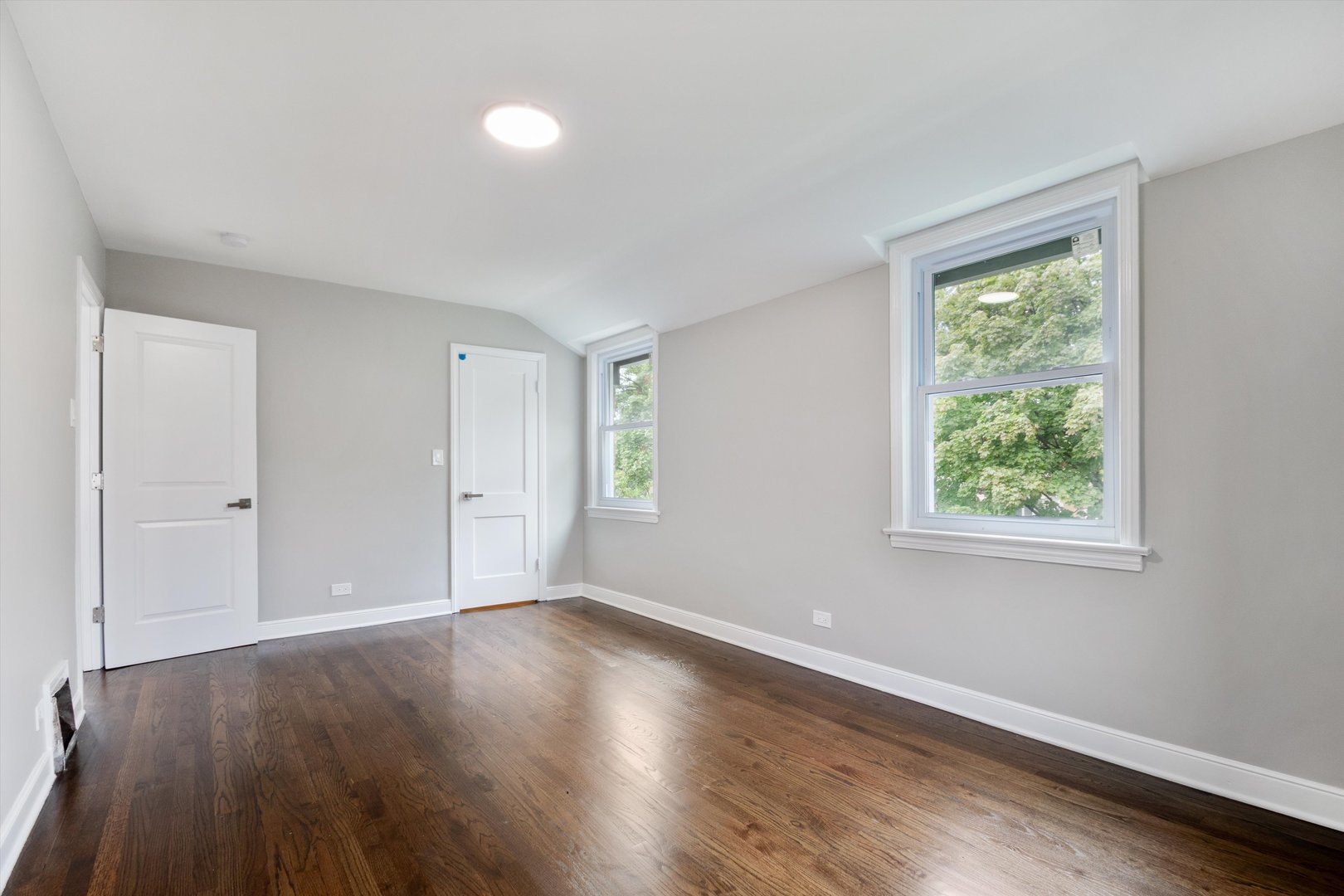 2513 5th Avenue North Riverside, IL 60546 - Photo 15 of 27 a view of an empty room with wooden floor and a window