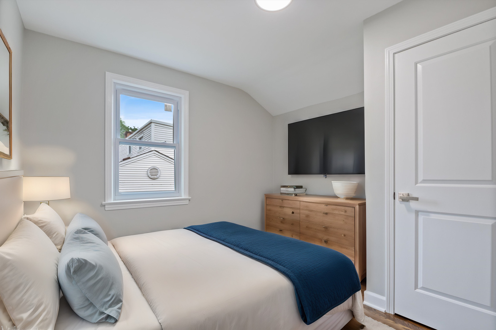 2513 5th Avenue North Riverside, IL 60546 - Photo 17 of 27 a bedroom with a bed and a flat screen tv