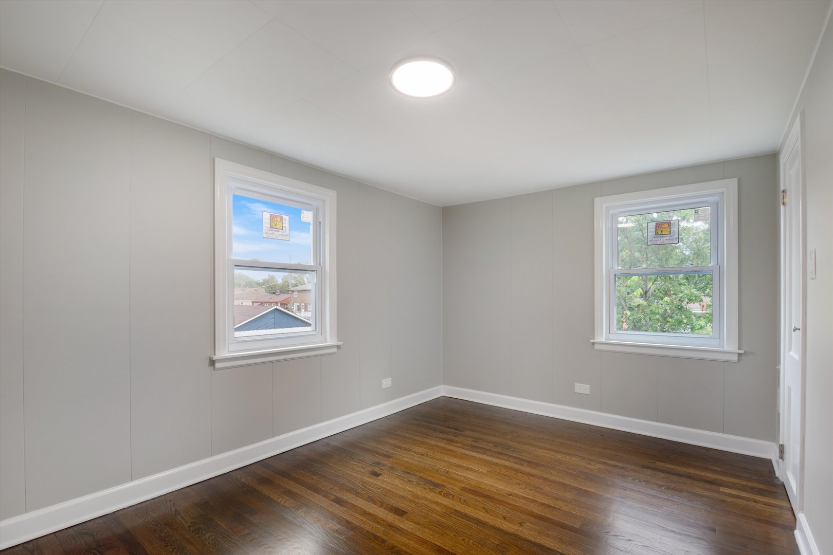 2513 5th Avenue North Riverside, IL 60546 - Photo 18 of 27 an empty room with wooden floor and windows