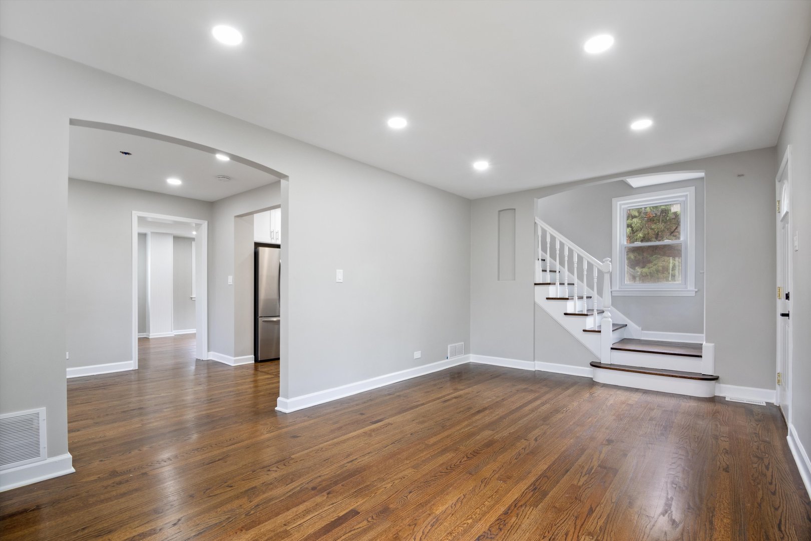 2513 5th Avenue North Riverside, IL 60546 - Photo 5 of 27 an empty room with wooden floor and windows