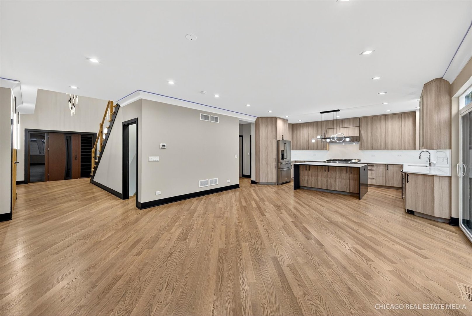 6090 Belmont Road Downers Grove, IL 60516 - Photo 18 of 75 a view of kitchen view wooden floor appliances and cabinets