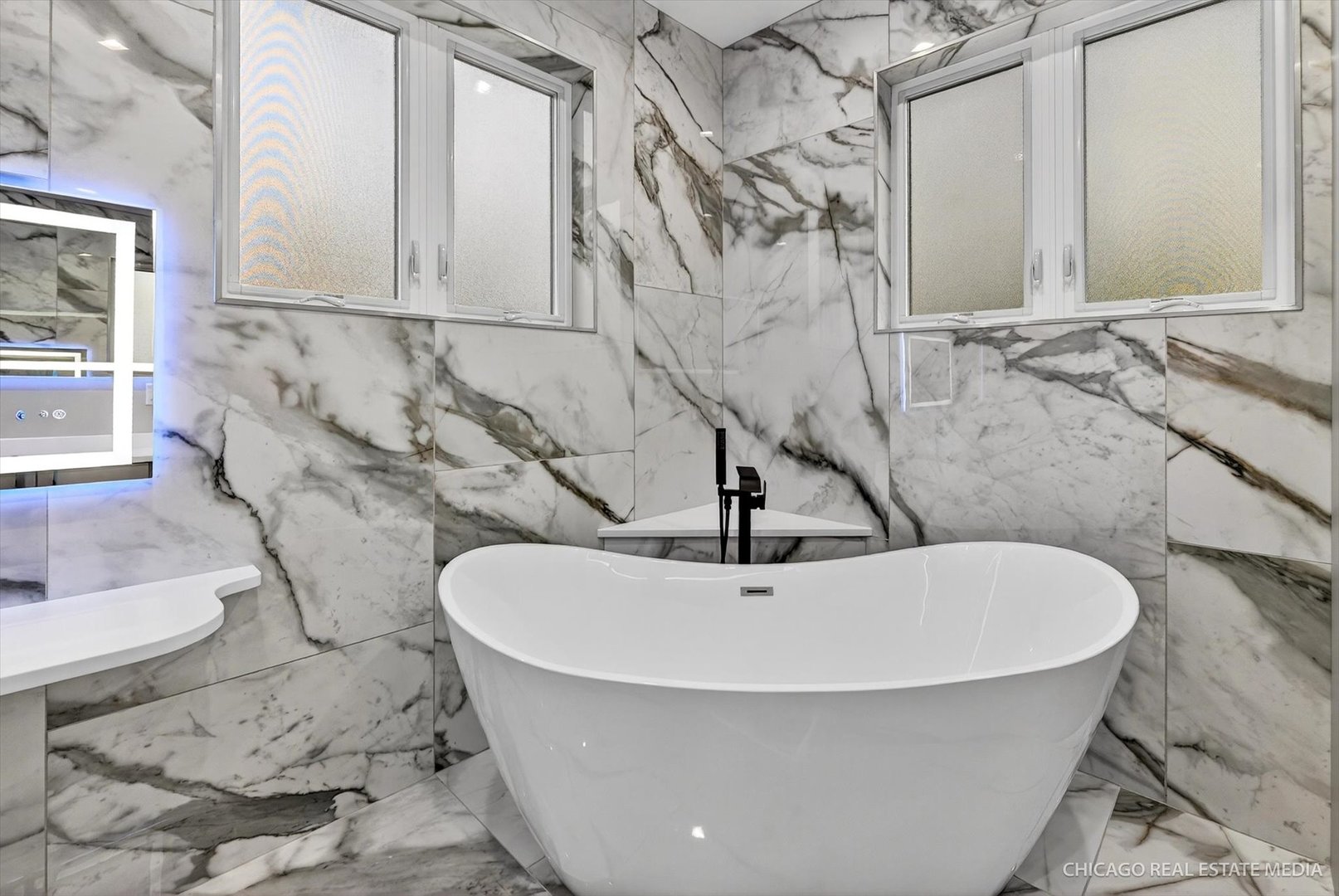 6090 Belmont Road Downers Grove, IL 60516 - Photo 40 of 75 a white bath tub sitting in a bathroom