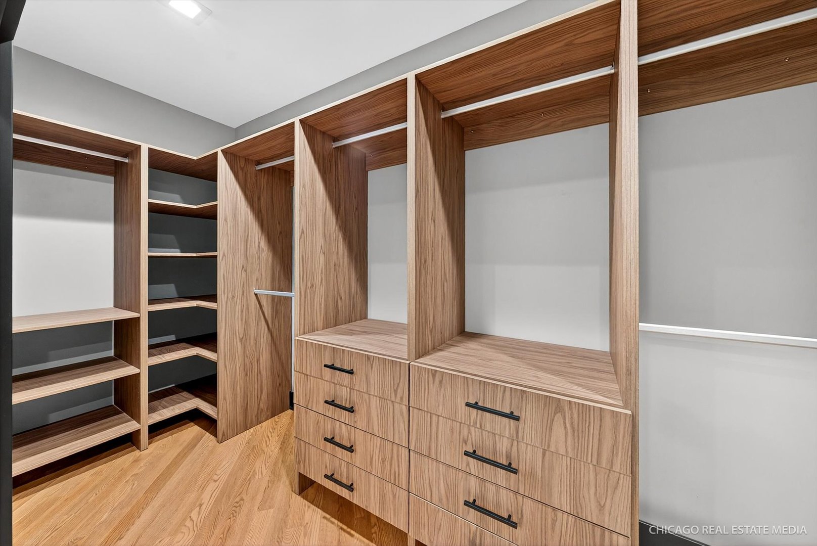 6090 Belmont Road Downers Grove, IL 60516 - Photo 44 of 75 a view of walk in closet with empty racks