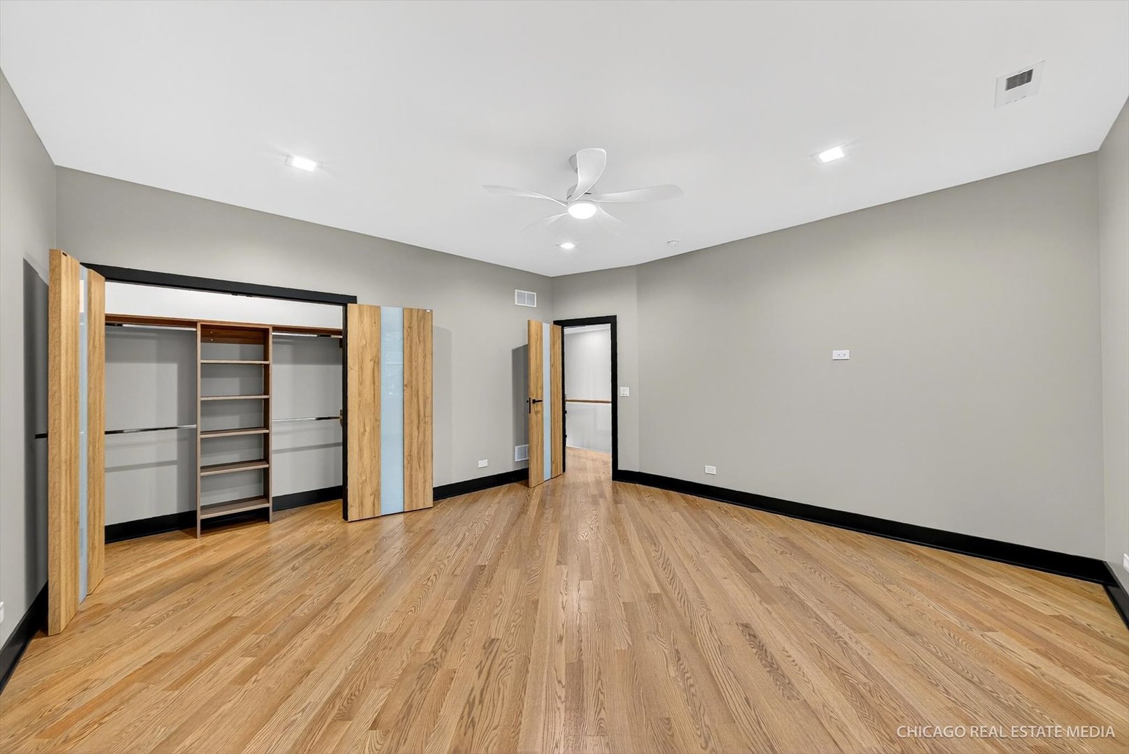 6090 Belmont Road Downers Grove, IL 60516 - Photo 51 of 75 wooden floor in an empty room with a window