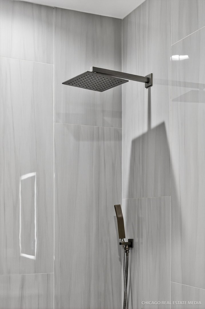 6090 Belmont Road Downers Grove, IL 60516 - Photo 57 of 75 a close view of shower tap