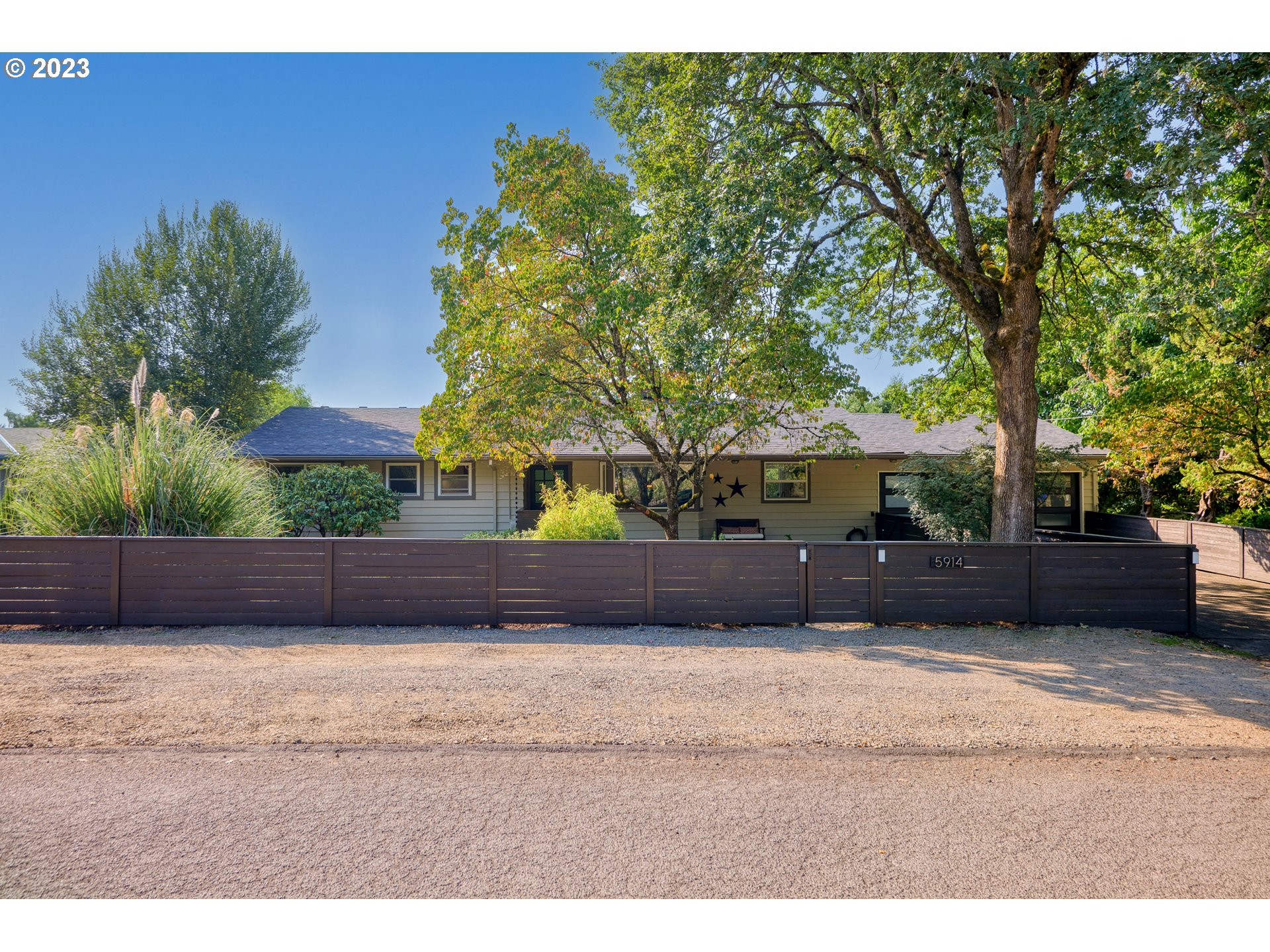 5914 Southwest Gunther Lane Portland, OR 97219 - Photo 1 of 40 a view of a yard