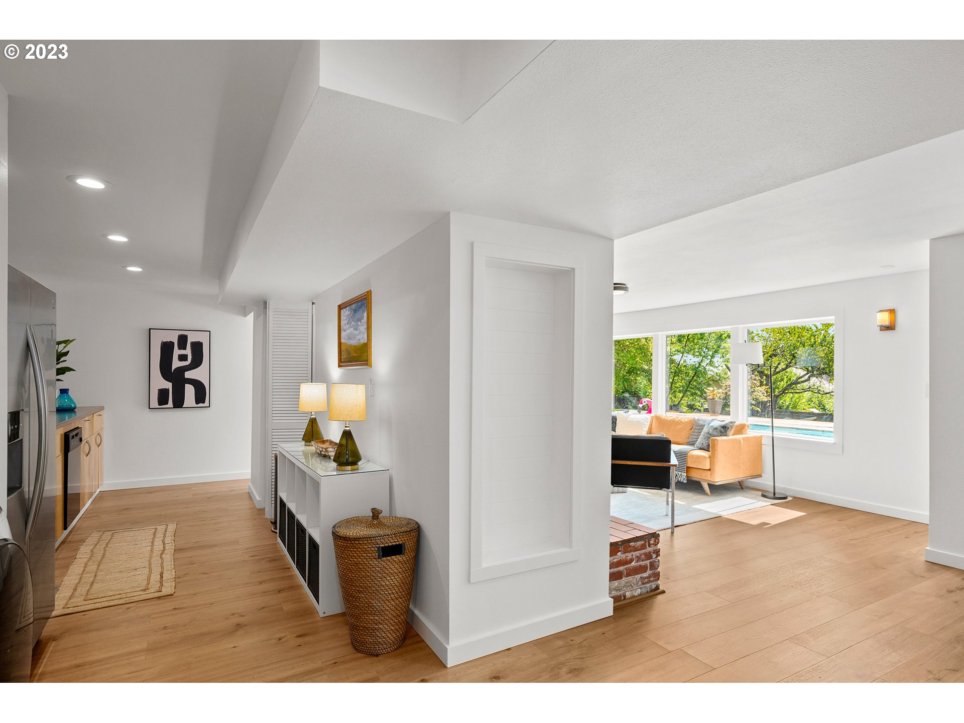 5914 Southwest Gunther Lane Portland, OR 97219 - Photo 25 of 40 a living room with furniture and a window