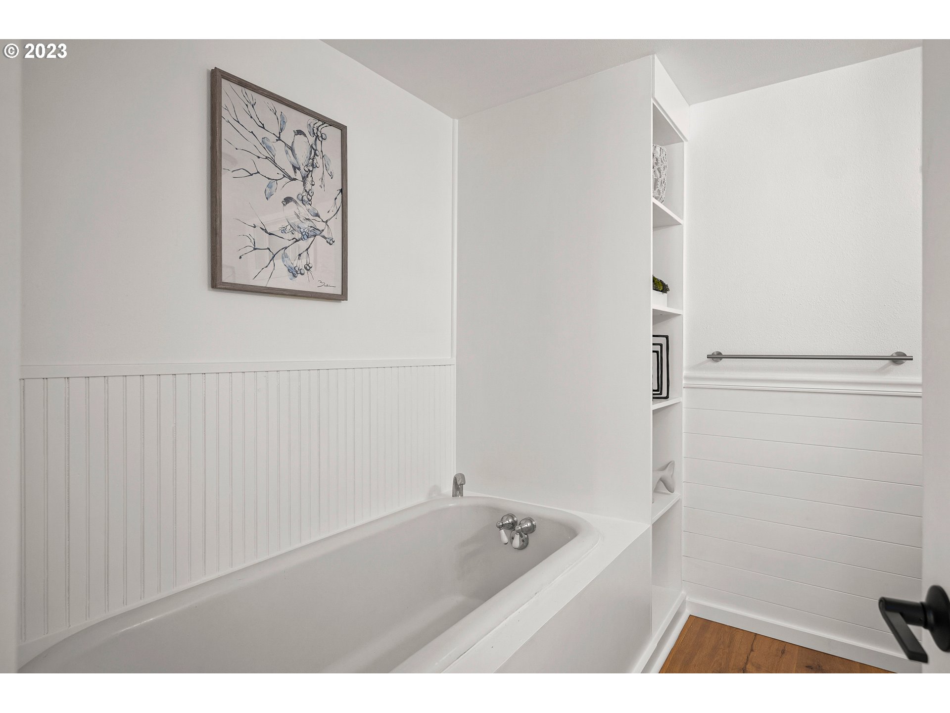5914 Southwest Gunther Lane Portland, OR 97219 - Photo 29 of 40 a bathroom with a tub and a shower