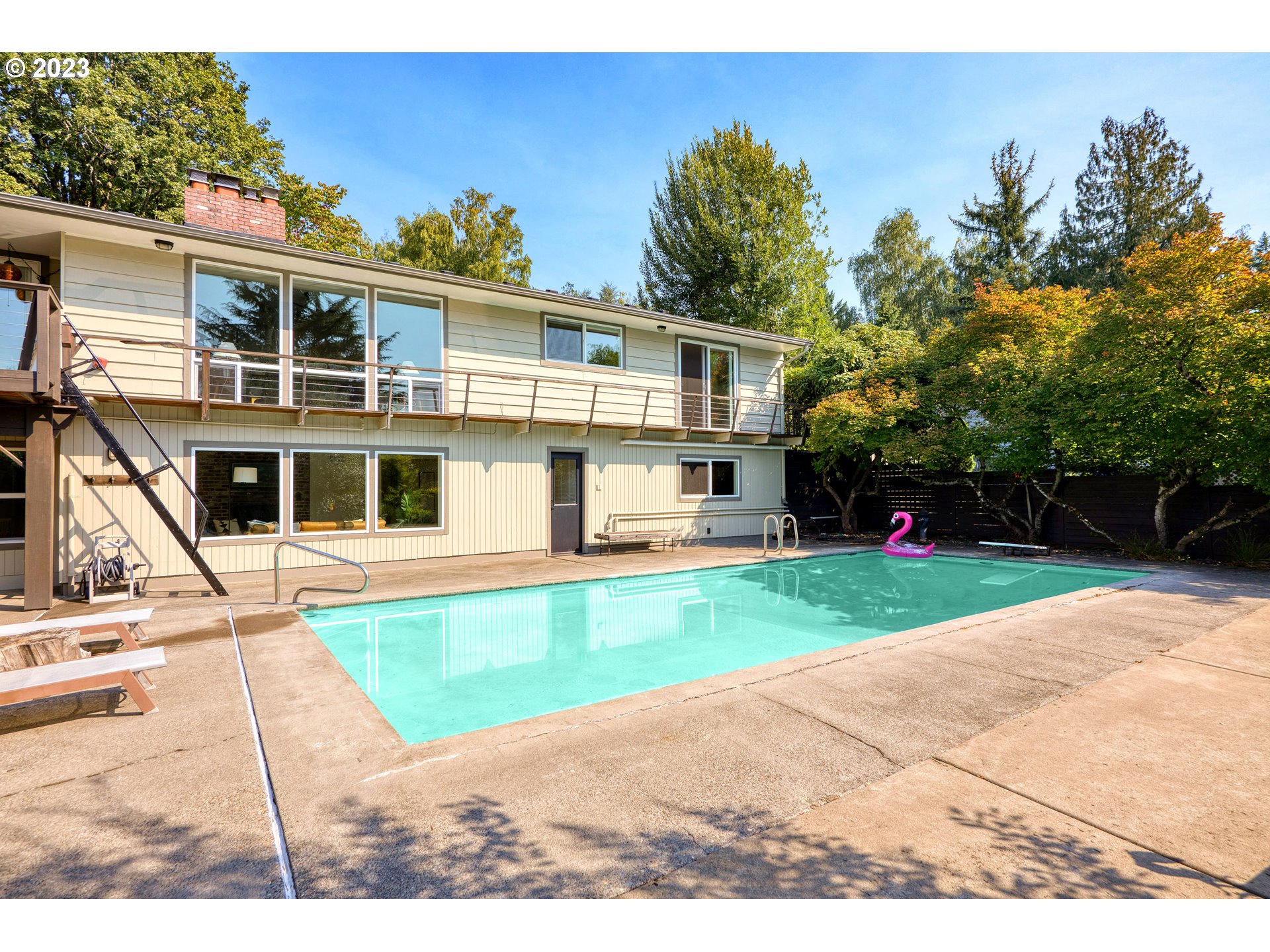 5914 Southwest Gunther Lane Portland, OR 97219 - Photo 33 of 40 a house view with a garden space
