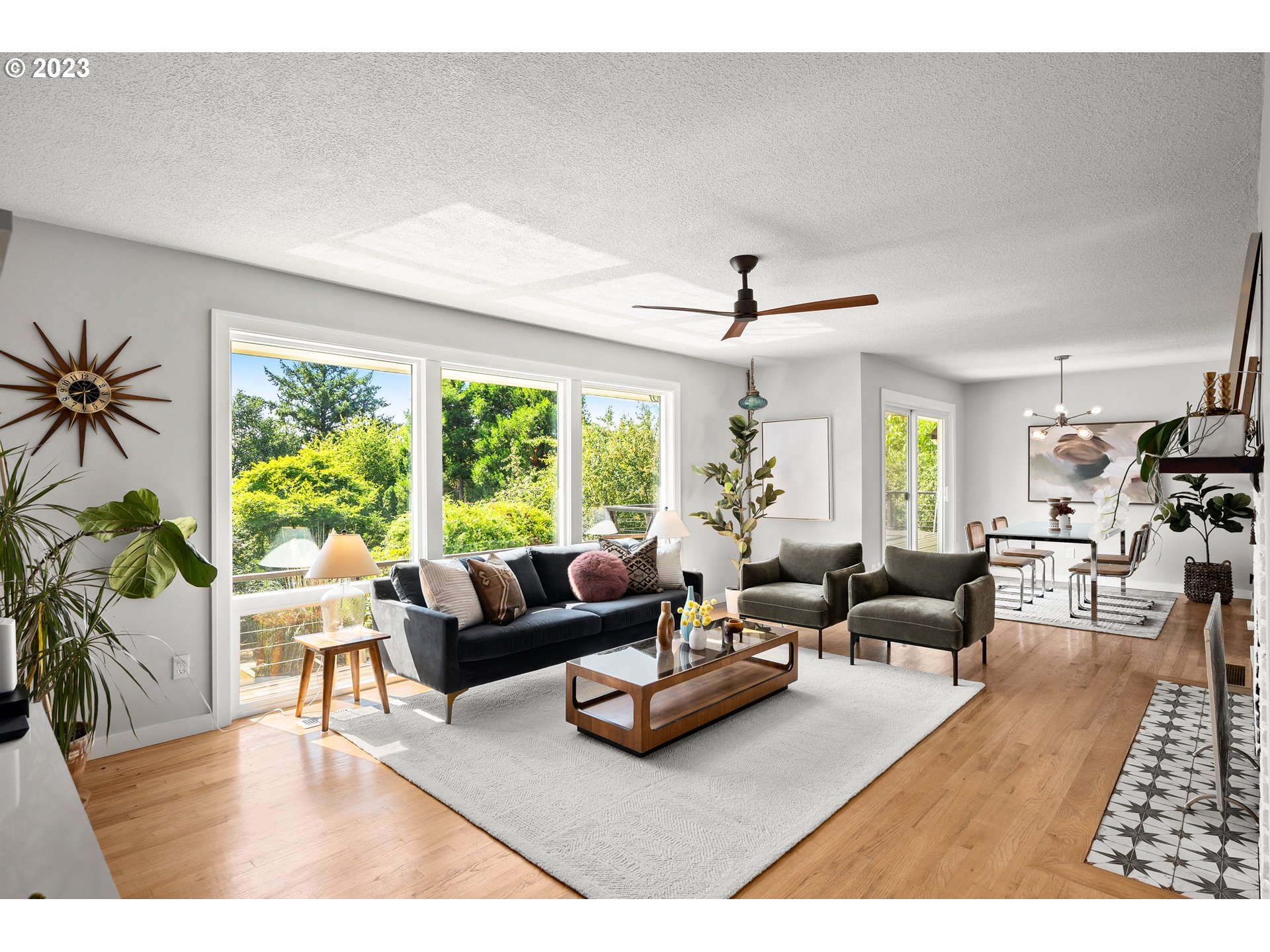 5914 Southwest Gunther Lane Portland, OR 97219 - Photo 5 of 40 a living room with furniture and a large window
