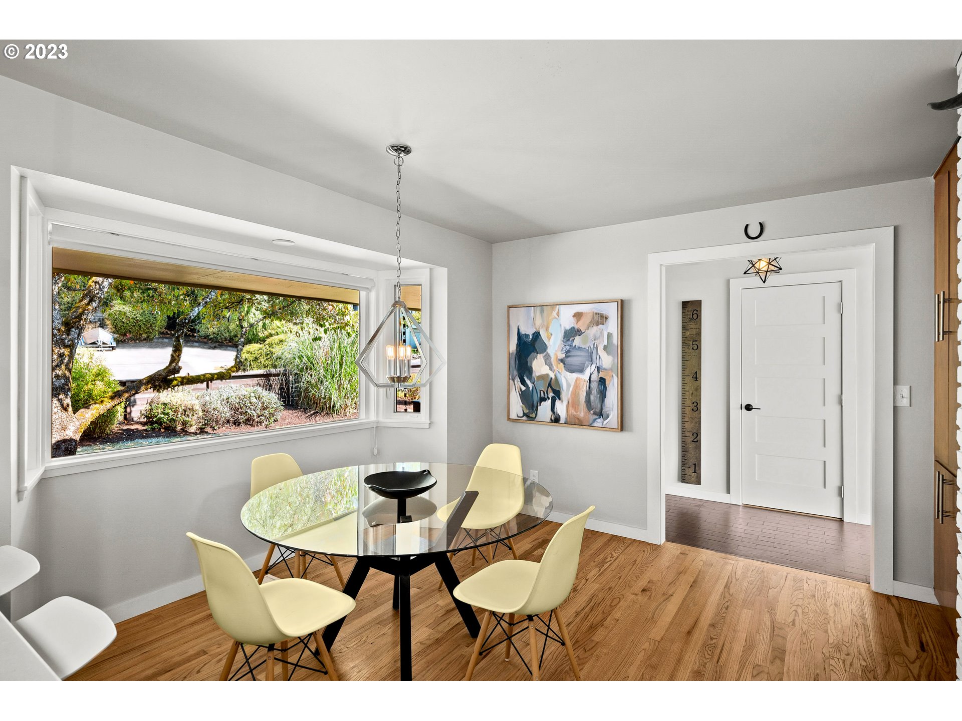 5914 Southwest Gunther Lane Portland, OR 97219 - Photo 9 of 40 a living room with furniture and a large window
