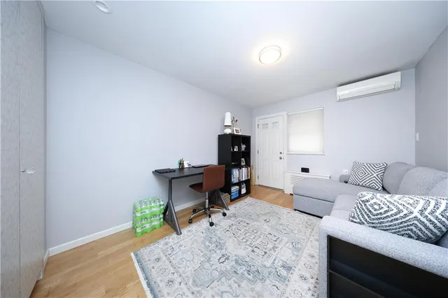 a living room with furniture and a couch