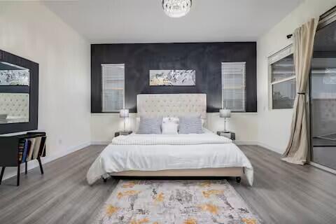 49527 Wayne Street Indio, CA 92201 - Photo 28 of 147 a bedroom with a bed a mirror and a desk