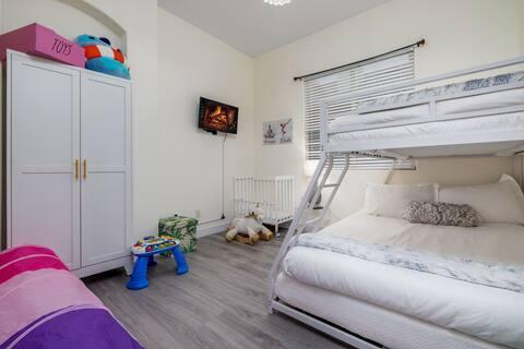 49527 Wayne Street Indio, CA 92201 - Photo 32 of 147 a bedroom with a bed and a potted plant